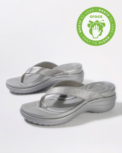 crocs silver flip flops