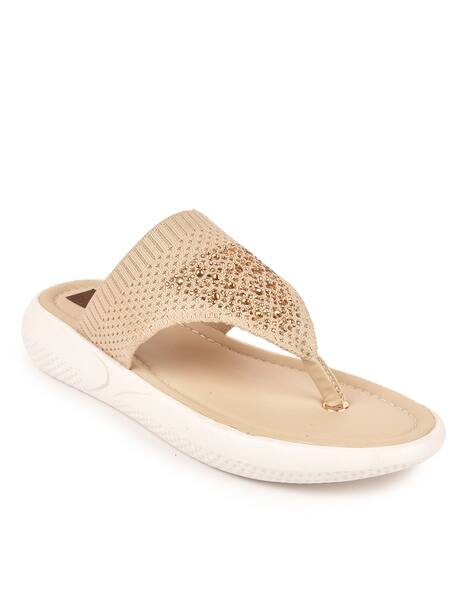 cream flip flops