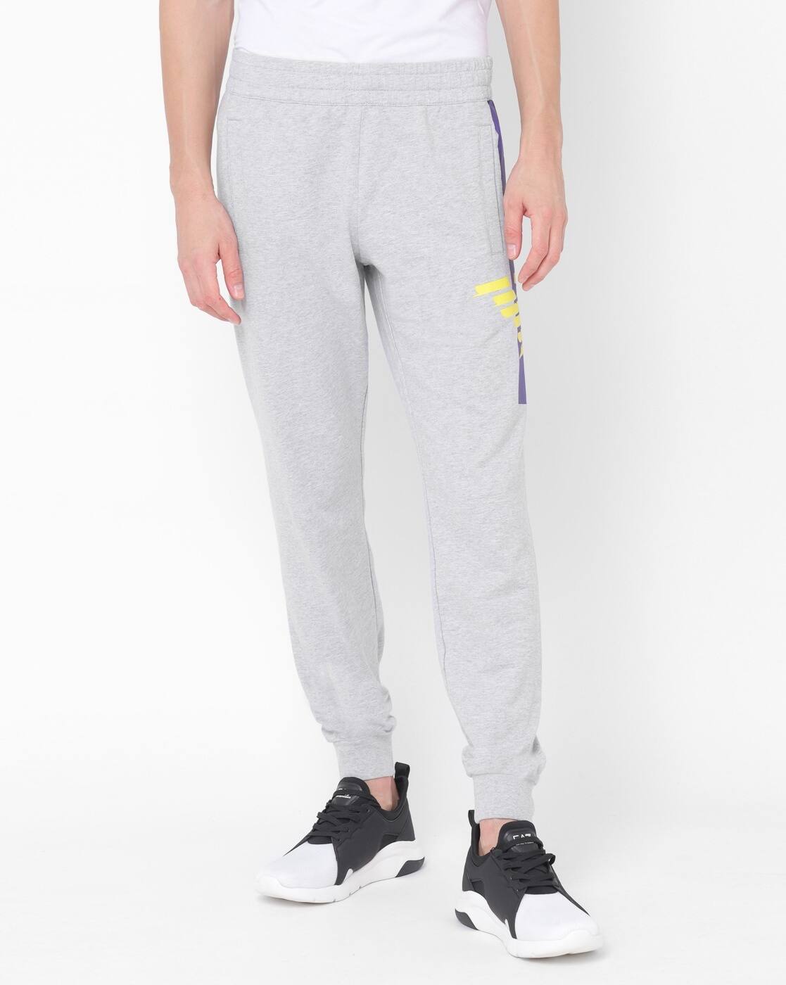 ea7 track pants mens