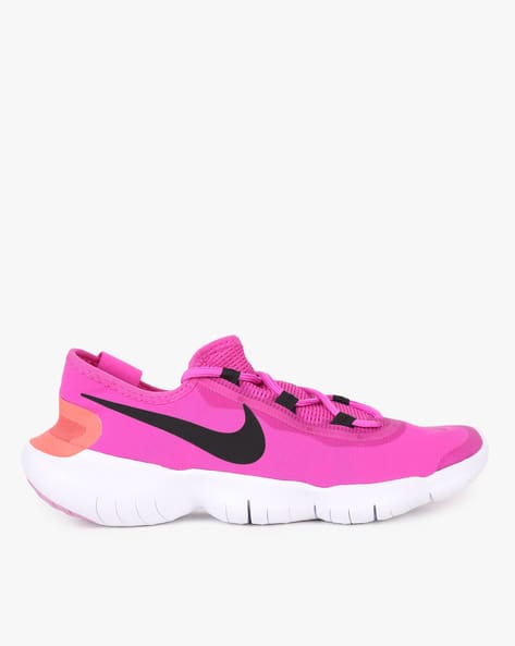 nike lace up shoes with signature branding