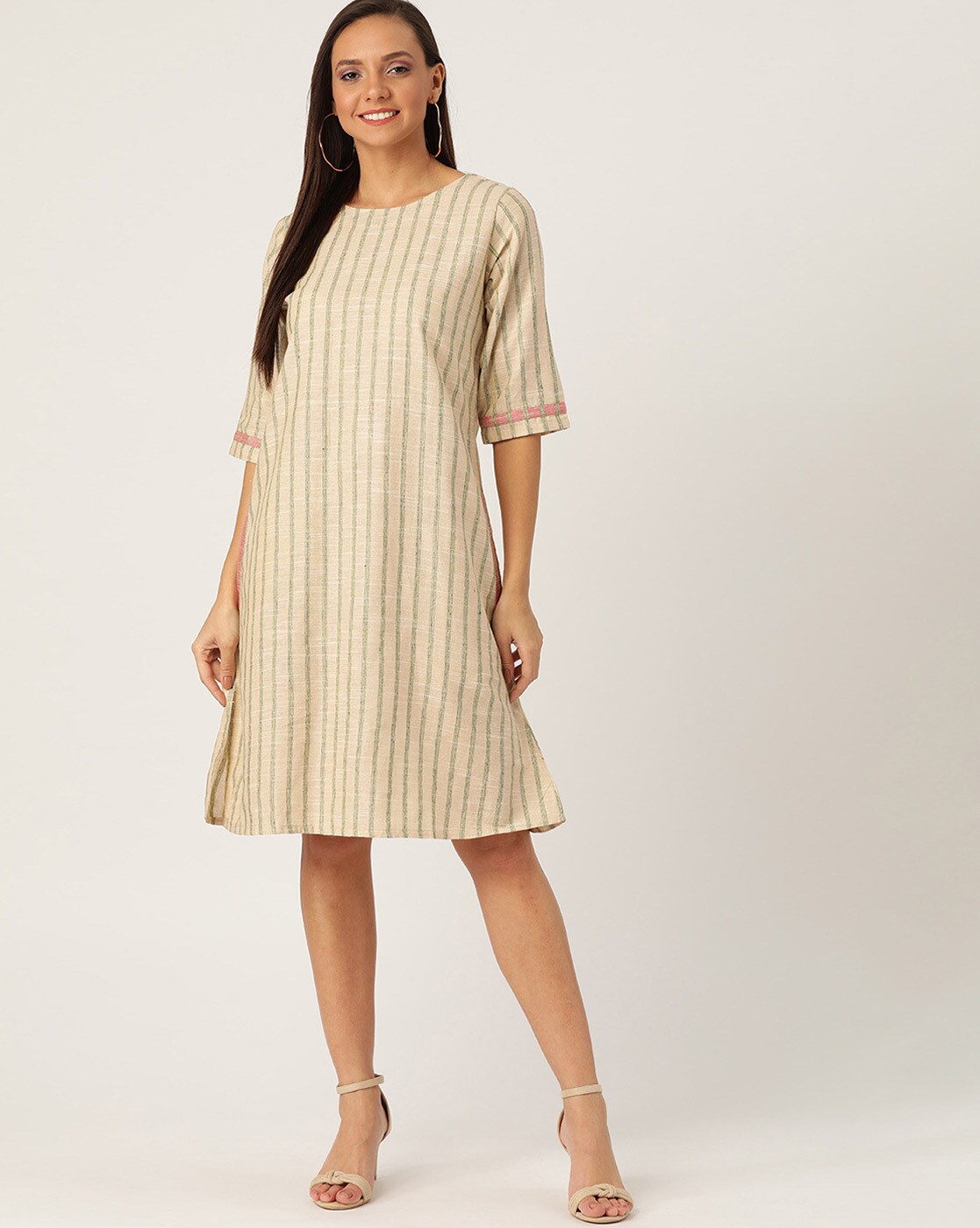 beige shift dress