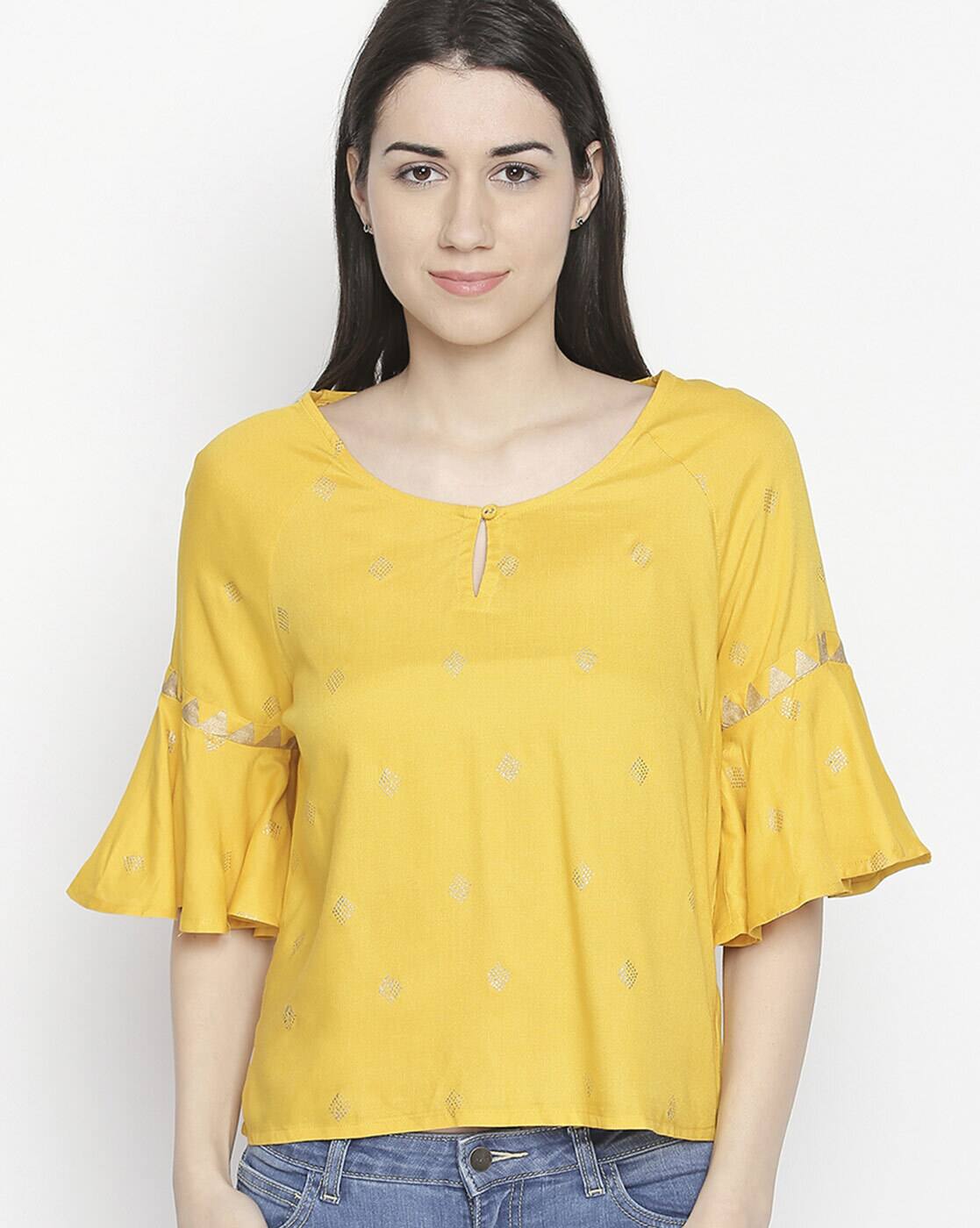 yellow embellished top