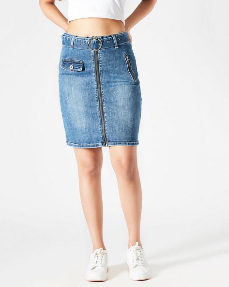 Old blue jeans skirt with metal button and zip ,denim jeans texture  isolated on white background, design for vintage style fashion  advertisement or garment factory business (with clipping path) Stock Photo |