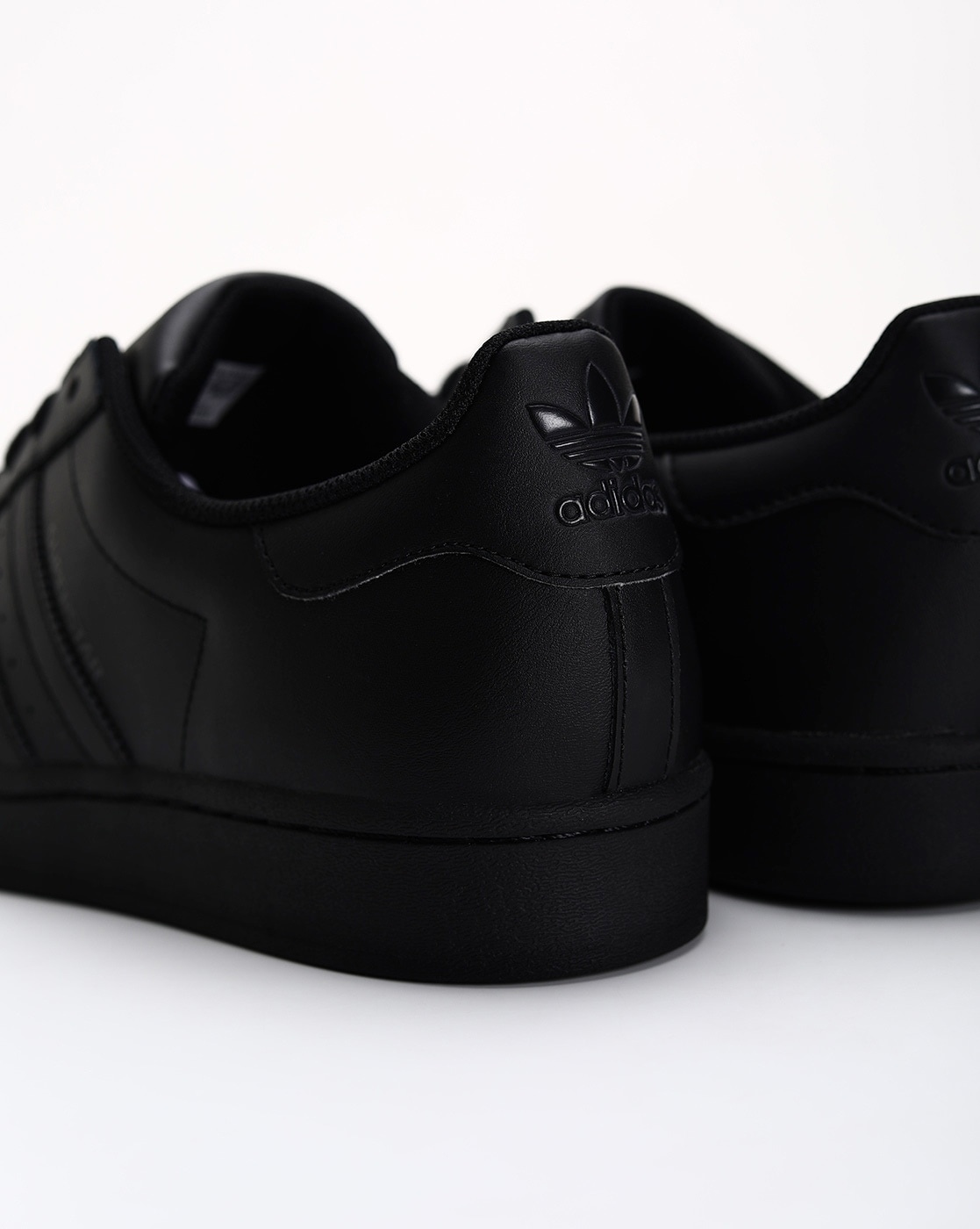 black adidas leather mens shoes