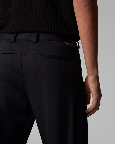 Stone Island Tapered SideZip Trousers  Harrods ES