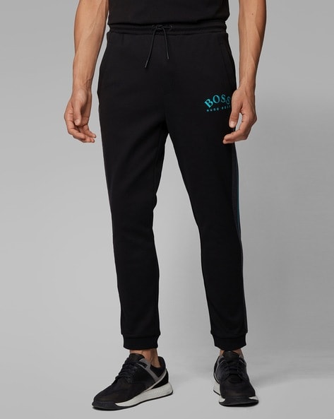 BOSS - Regular-fit tracksuit bottoms with decorative reflective artwork