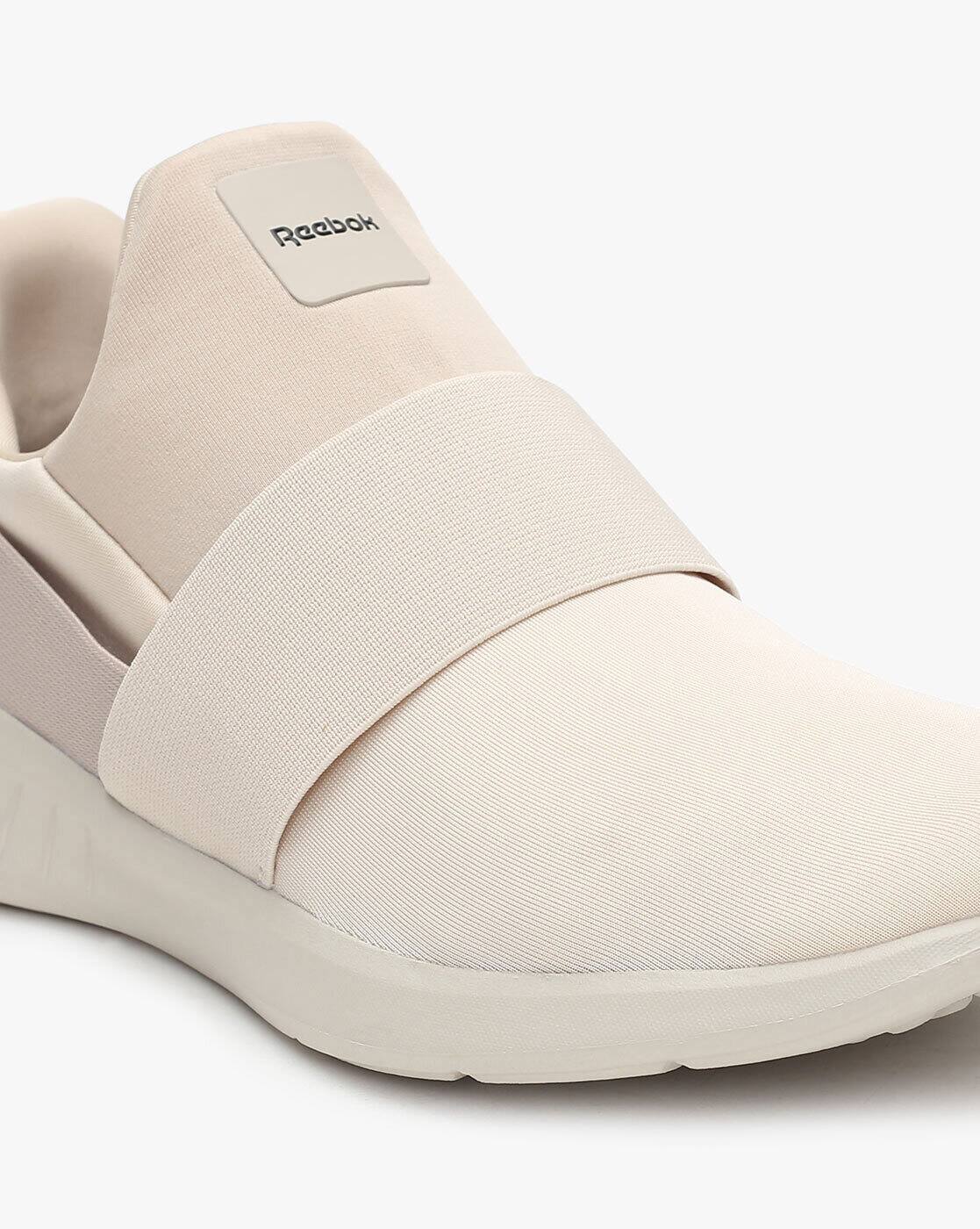 reebok lite slip on beige