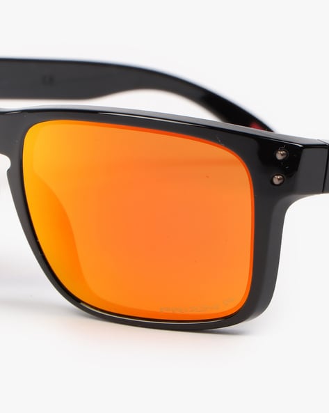 Orange oakley sales sunglasses