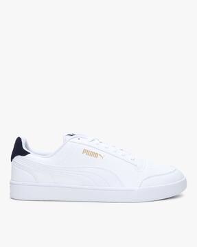 low top puma sneakers