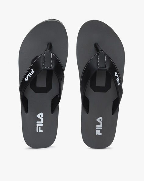 fila flip flops black