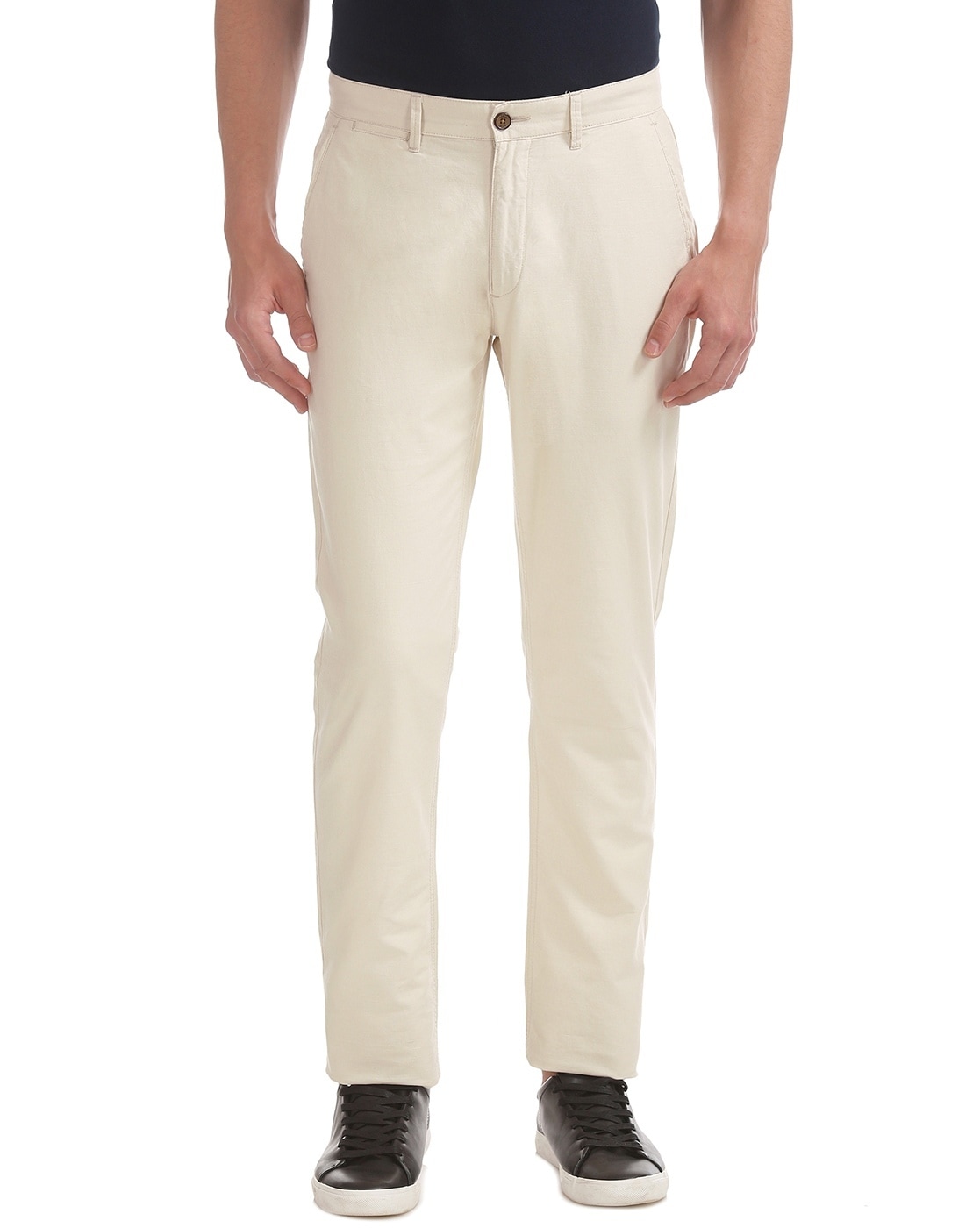 Buy Arrow Sports Men Off White Flat Front Solid Casual Trousers - NNNOW.com