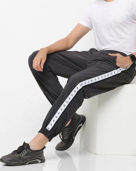 Calvin Klein Jeans Men's SIDE STRIPE NYLON TRACK Pants, Black (Ck Black  BAE), Large price in UAE | Amazon UAE | kanbkam
