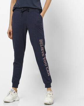 navy blue cuffed track pants