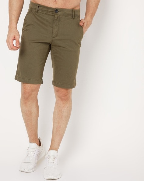 Buy Celio Men Khaki Solid Trousers Cum Shorts - Trousers for Men 1812301 |  Myntra