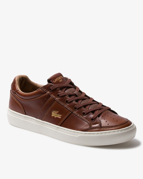 Aanvrager Kinderrijmpjes lettergreep Buy Brown Casual Shoes for Men by Lacoste Online | Ajio.com