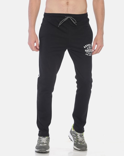 Buy Black Track Pants for Men by UNLIMITED Online | Ajio.com