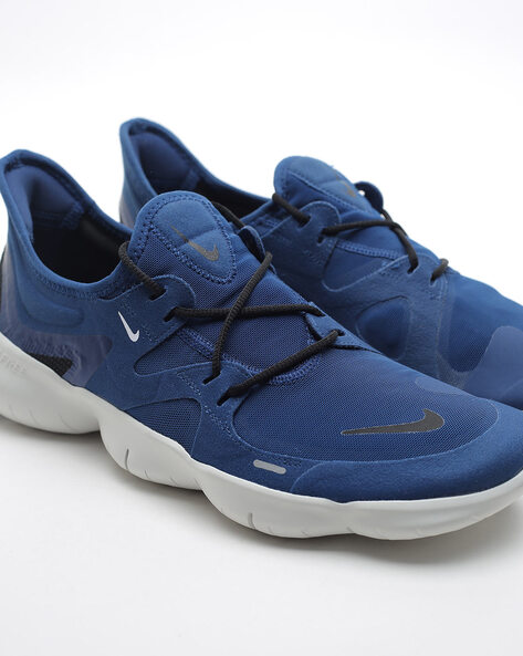 Nike free rn store blue running shoes