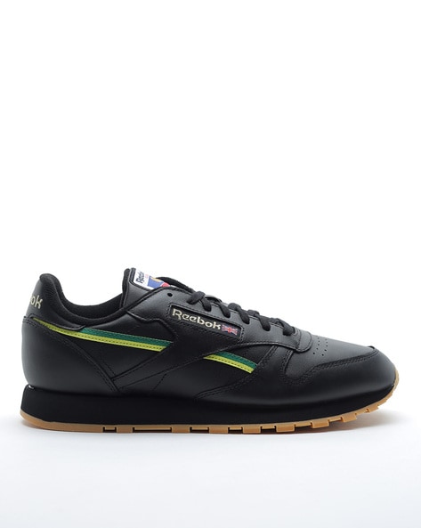 Reebok black store classic leather trainers