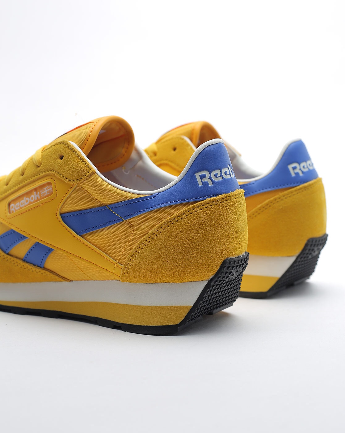 Reebok shoes mens sales gold