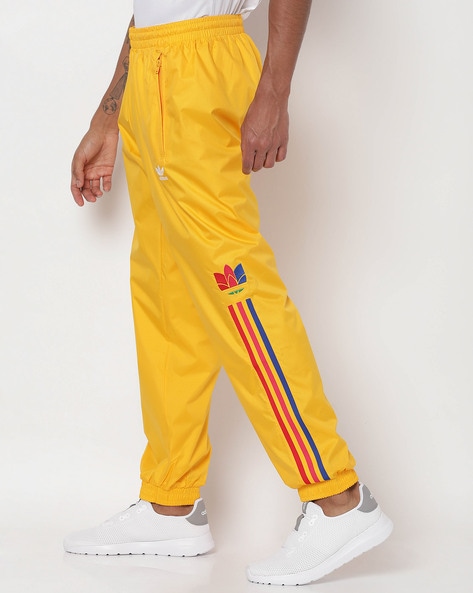 mens yellow adidas pants