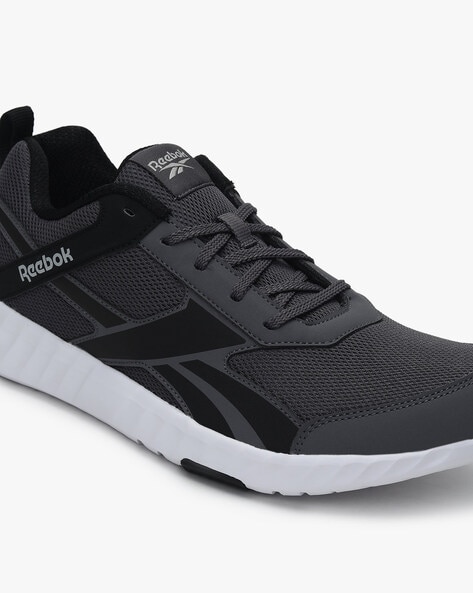 reebok concuester running shoes