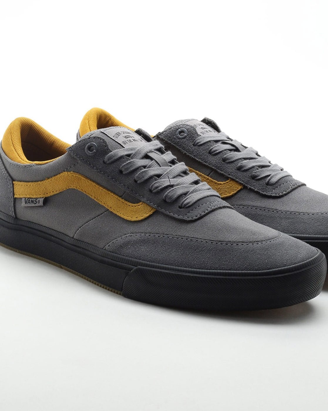 grey and yellow vans