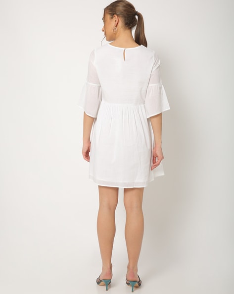 a line white dress with sleeves