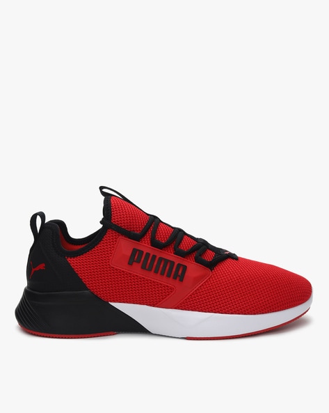 red low top pumas