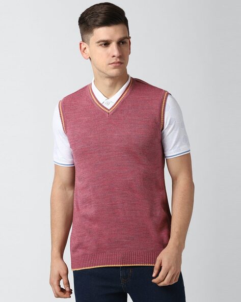 pink sleeveless sweater