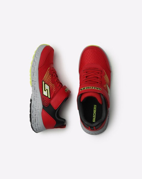 red sketcher shoes