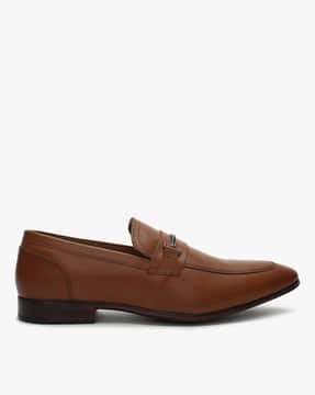 red tape slip ons