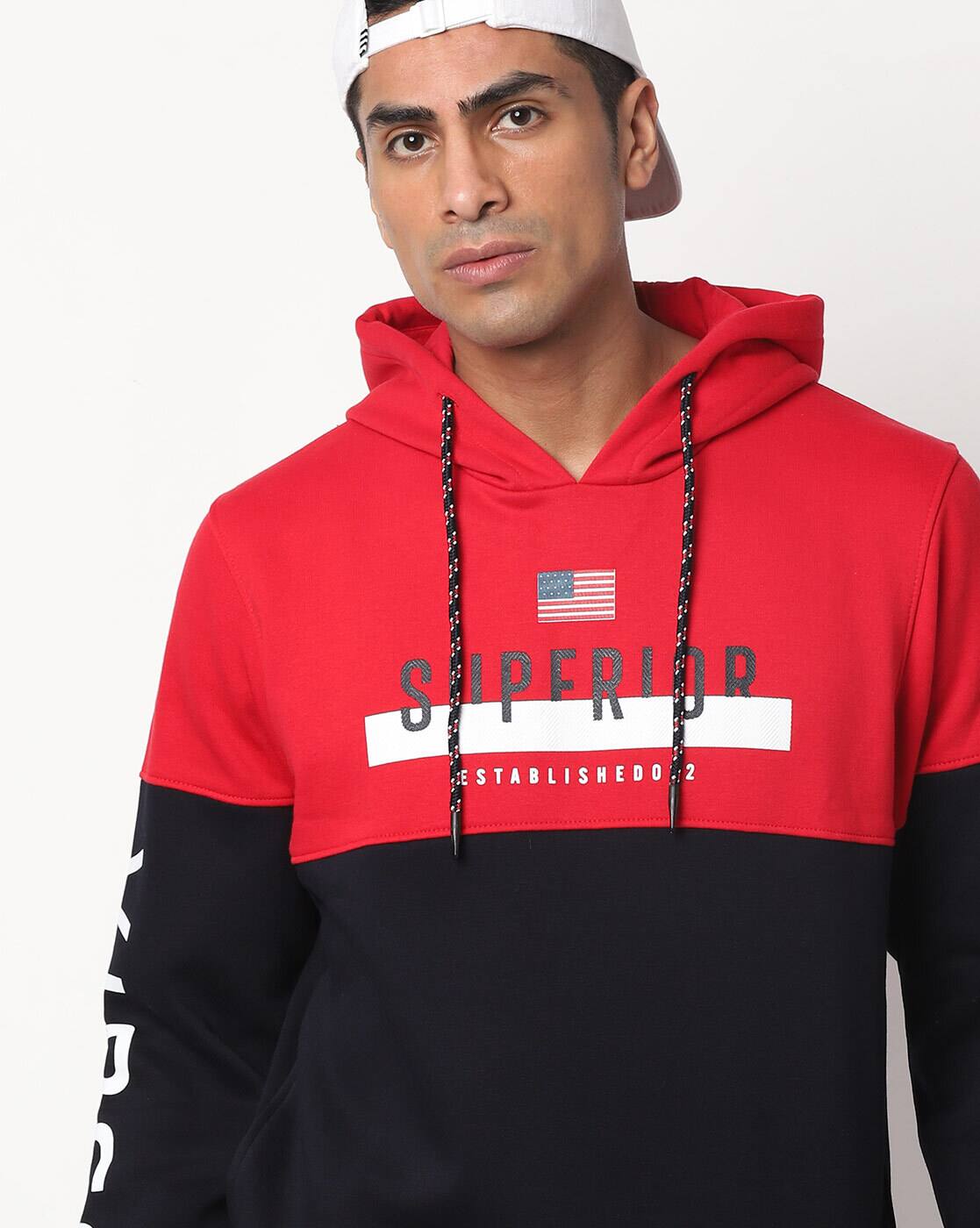 navy blue and red sweatshirt