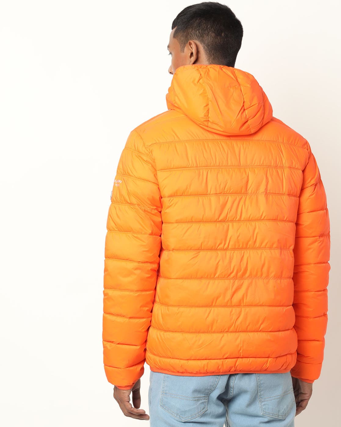 light orange puffer jacket