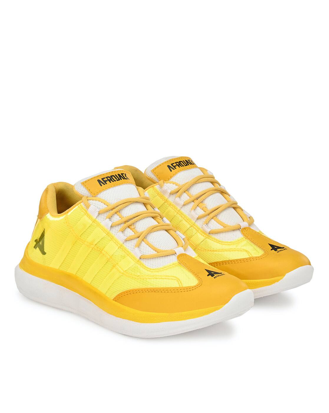 yellow sports shoes