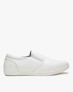 red tape slip ons