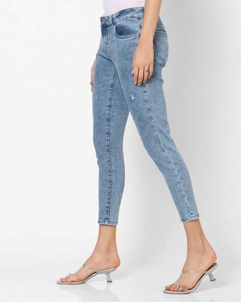 light wash distressed skinny jeans