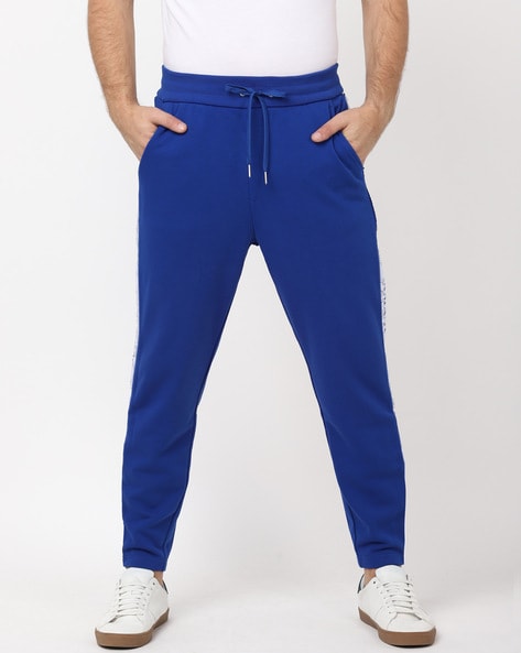 Solid Men Blue Track Pants FS-BL 01 in Goa at best price by Navneet  Enterprises - Justdial