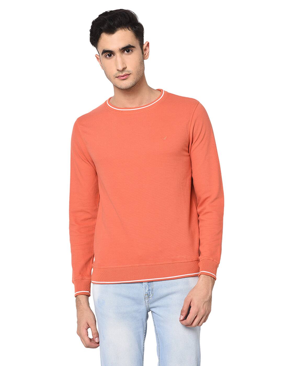 peach sweatshirt