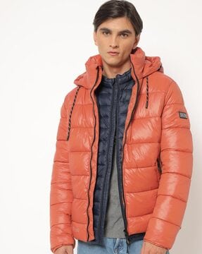 orange hooded puffer jacket