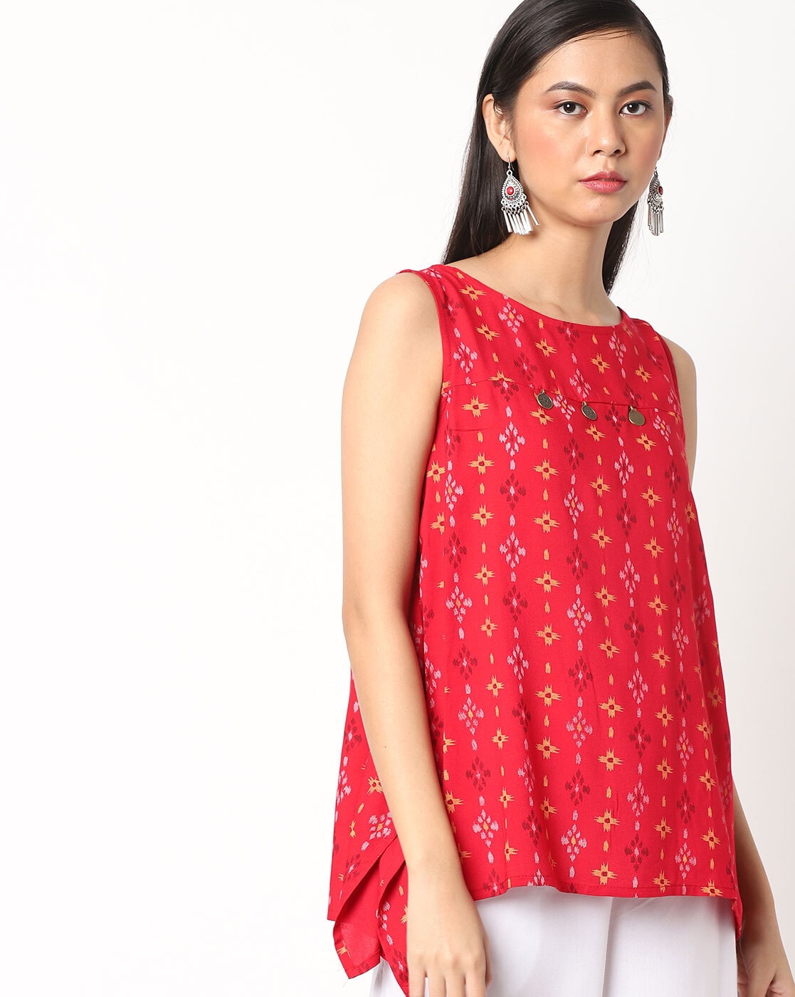 red sleeveless tunic