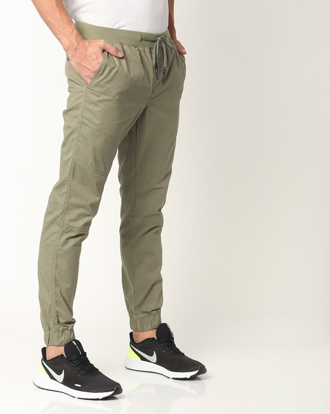 Buy Olive Green Track Pants for Men by DNMX Online  Ajiocom