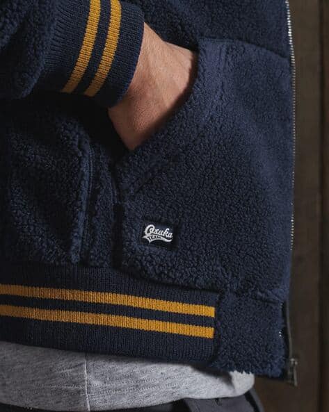 sherpa varsity bomber jacket