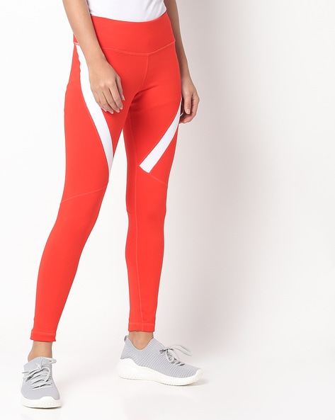 Buy Orange & White Leggings for Women by Reebok Online