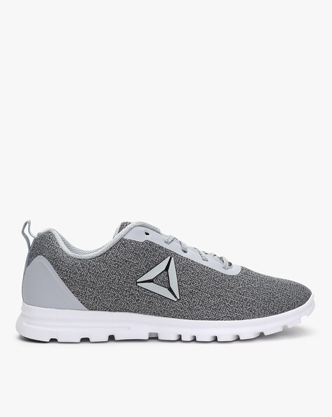 reebok textured lace up sports shoes