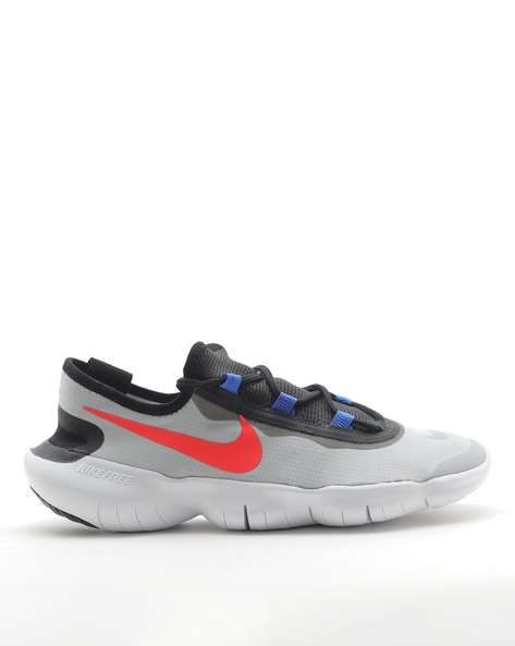 Buy Grey Sports Shoes for Men by NIKE Online Ajio