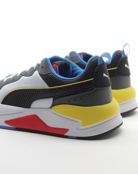 PUMA Colorblock Sneakers — 8 Cool Outfit Ideas For Colorful Tennis Shoes -  The Mom Edit