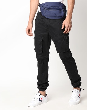 Buy Black Track Pants for Men by DNMX Online