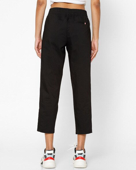nike tech woven cropped pant