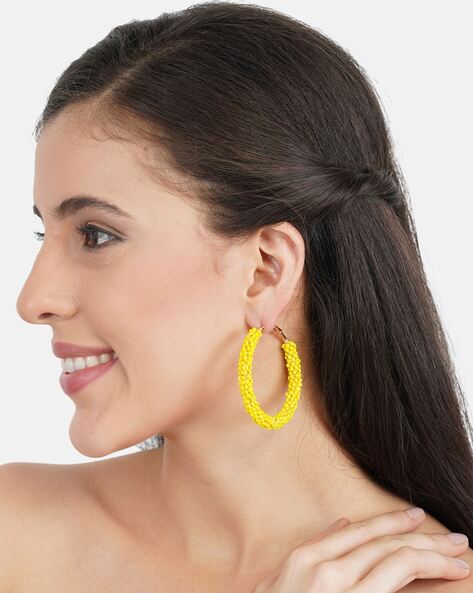 Buy Shocking Gold Statement Earrings Online in India | Zariin