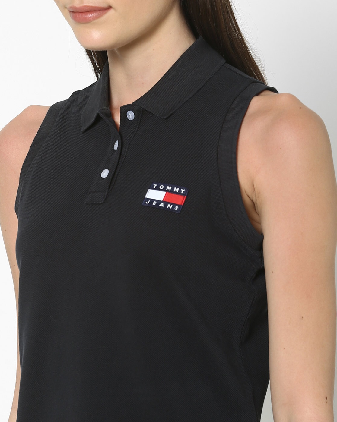 black sleeveless polo top